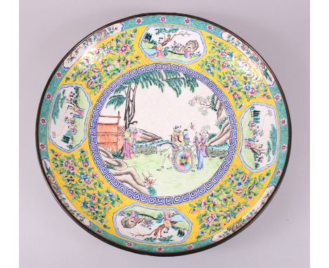A GOOD AND LARGE 19TH CENTURY CHINESE ENAMEL CHARGER / DISH,  the main central panel surrounded by greek key border depicting