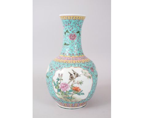 A CHINESE FAMILLE ROSE BOTTLE SHAPED VASE, the main body decorated upon a turquoise ground with panels of birds amongst nativ