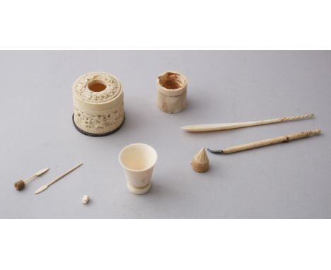 A LOT OF 9 CHINESE 19TH CENTURY IVORY ITEMS, consisting of two carved ivory cups, a carved ivory snuff ladle, a cantonese cyl