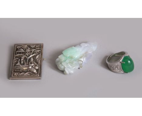 A MIXED LOT OF CHINESE ITEMS, consisting of one jadeite pendant in the form of a flower, 5cm , one 20th century silver brooch