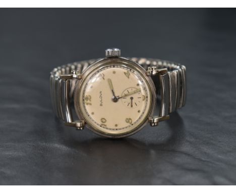 A gent's vintage Bulova manual wrist watch having Arabic numeral and dot dial with subsidiary seconds in a 10K white gold pla