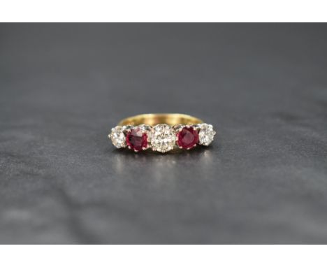 A five stone diamond and ruby ring having three diamonds, total approx 1ct interspersed by two rubies, total approx 1ct all i