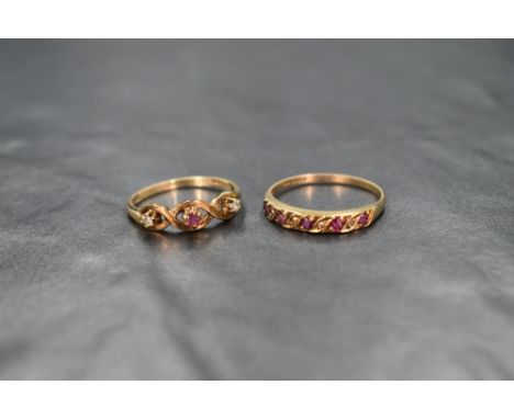 A 9ct gold ruby and diamond trilogy ring, the central round cut ruby flanked by two diamond chips in an infinity openwork set