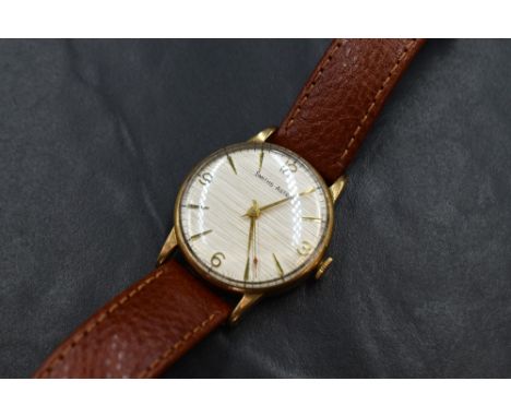 A gent's 9ct gold 1960's Smiths Astral manual wrist watch having Arabic quarter numerals, baton markers and a red pointer swe