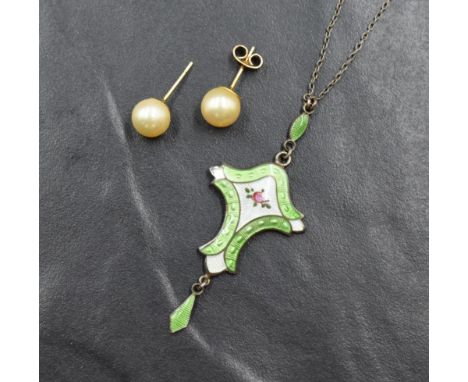 A silver and enamel Art Nouveau style pendant having central rose decoration and green enamelled drop and fixed chain, Birmin