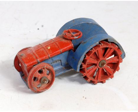 A Dinky Toys pre-war No. 22E farm tractor, comprising of blue and red body, model requires some restoration to front axle, ot