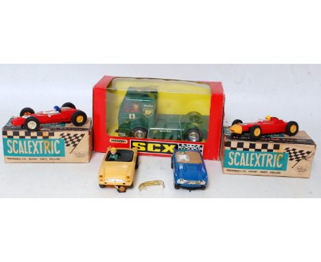 A collection of boxed Scalextric and Matchbox slot racing cars to include an SCX Matchbox No. 83640 BP Mercedes Benz racing c