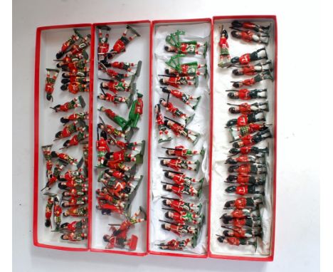 Four trays containing a collection of various Britains, Crescent, John Hilco and other lead hollow cast Highlander and Piper 