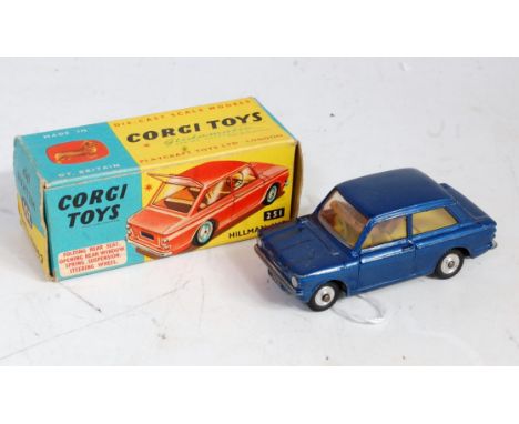 A Corgi Toys No. 251 Hillman Imp comprising of dark metallic blue body with yellow interior and luggage piece included with s