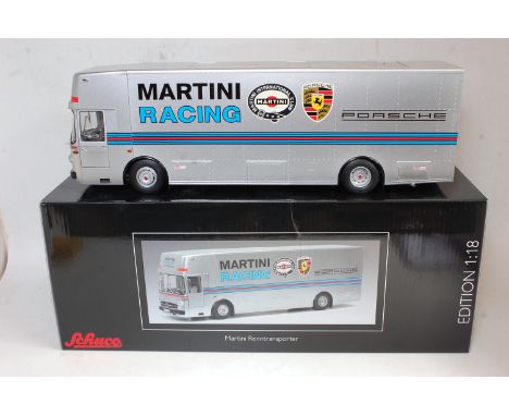 A Schuco No. 450032100 1:18 scale limited edition model of a Mercedes 317 Martini Racing Porsche car transporter, appears as 