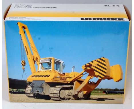 An NZG No. 799 Liebherr RL64 Pipe Layer, housed in the original polystyrene packed box, appears as issued