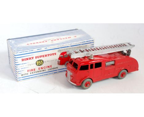 A Dinky Toys No. 955 fire engine comprising red body with matching hubs and silver ladder in the original lift-off lid blue &