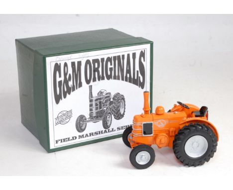 A G&amp;M Originals 1/32 white metal and resin model of a Field Marshall Series III tractor, finished in orange and silver wi