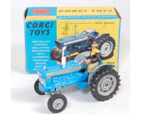 A Corgi Toys No. 67 Ford 5000 Super Major tractor, comprising of light blue and grey body with driver figure and grey plastic