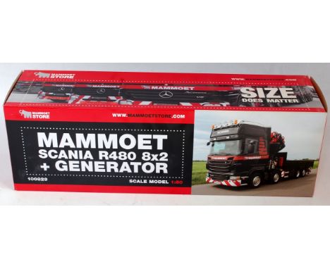 A WSI Models No. 02-176 1/50 scale model of a Scania R480 8x2 flatbed with crane and a generator, finished in Mammoet livery,