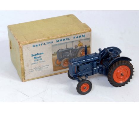 A Britains Farm series No . 128F Fordson Major tractor comprising dark blue body with orange hubs in the original green label