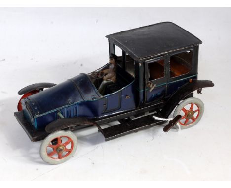 A JDP of France circa 1920s tinplate and clockwork saloon model No. 7354 comprising of two-tone dark blue and light blue body