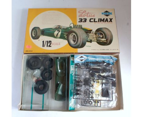 A Kogure kit No. F213-900 1/12 scale plastic kit for a Lotus 33 Climax racing car, appears as issued in the original all-card