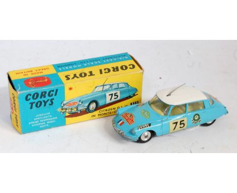 A Corgi Toys No. 323 Citroen DS19 in Monte Carlo trim comprising light blue body with white roof and yellow interior, and spu