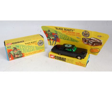 A Corgi Toys No. 268 The Green Hornets Black Beauty comprising of black body with hornet transfer to roof with green interior