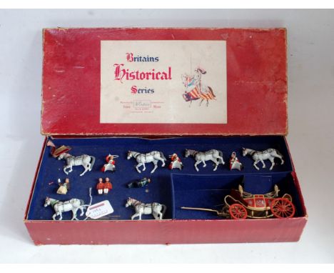 A Britains set No. 9402 state open Landau comprising three Windsor grey team horses with drivers holding whips, together with