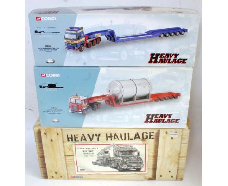 Three various boxed Corgi heavy haulage 1/50 scale commercial vehicles to include No. CC12406 a Banks Brothers Volvo Globetro