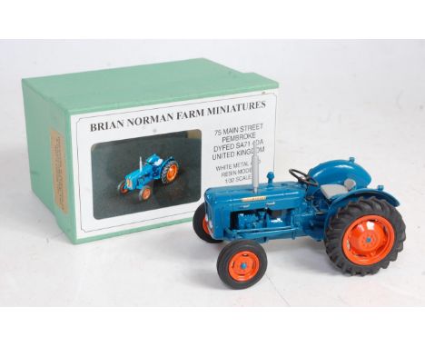 A Brian Norman farm miniatures 1/32 scale white metal and resin model of a Fordson Dexter three cylinder diesel tractor compr