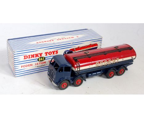 A Dinky Toys No. 942 Foden 14 ton tanker comprising of dark blue cab and chassis with dark blue, white and red back with red 