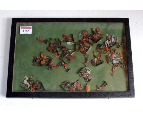 A collection of Heinriksson lead flat military miniatures to include various Royal Scots, Mounted lifeguards together with ot