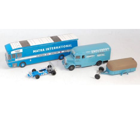 Two loose 1/43 scale resin and white metal classic car transporter and trailer kit built models to include a Matra Internatio