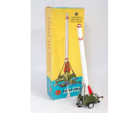 A Corgi Toys No. 1112 Corporal Guided Missile on Mobile Launcher comprising green and base metal launcher with white and red 