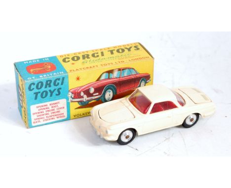 Corgi Toys, 239, Volkswagen 1500 Karmann Ghia, cream body with red interior and spun hubs, silver base plate, in the original