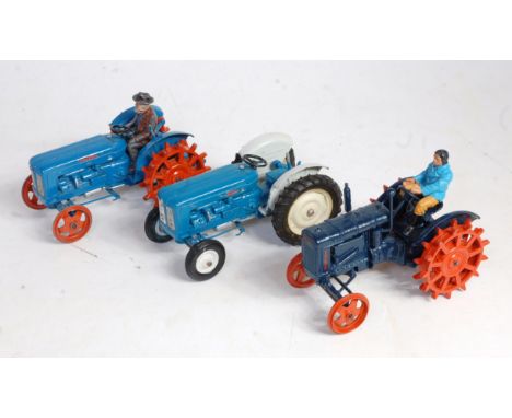 Three various loose Britains farming vehicles to include No. 127F Fordson Major tractor with orange spud wheels (VG) together