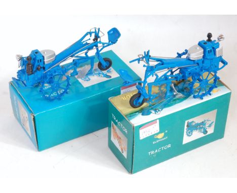 Two boxed Asio elephant tractor series diecast models of two tractors both finished in blue, identical examples, some plastic