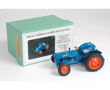 A Brian Norman farm miniatures 1/32 scale white metal and resin model of a Fordson Dexter 3 cylinder diesel tractor, model No