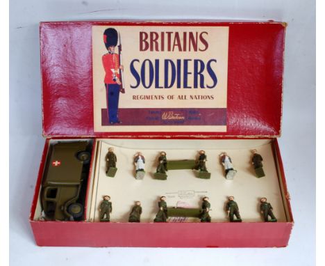 A Britains set No. 1897 RAMC motor ambulance unit in battle dress, 1948 version comprising of doctor with cane in battle dres