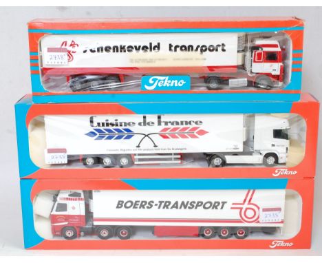 A Tekno 1/50 scale boxed road haulage diecast group to include a Cuisine de France Scania R164L/580 Topline with refrigerator