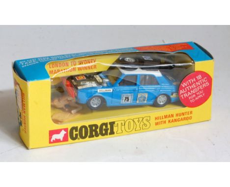 A Corgi Toys No. 302 Hillman Hunter racing saloon with kangaroo figure comprising blue and white body with grey interior and 