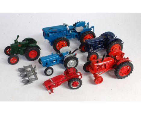 One tray containing six various white metal and resin hand built tractor models to include Brian Norman farm miniatures, Ford
