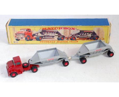 A Matchbox Major Pack series No. 4 Fruehauf hopper train, comprising of dark red cab and chassis with two Fruehauf silver tra