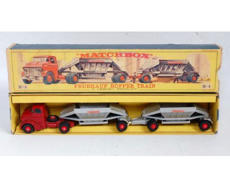 A Matchbox Major series No. M4 Fruehauf hopper train comprising of dark red tractor unit with two silver trailers with Frueha