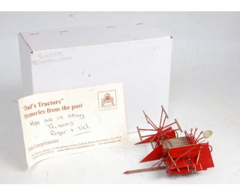 A Dad's Tractors 'Memories from the Past' 1/32 scale white metal and resin model of a McCormick-Deering binder finished in re
