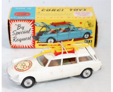 A Corgi Toys No. 475 Citroen Safari Olympic Winter Sports saloon, comprising of white body with brown and green interior, and