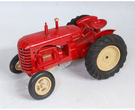 A Lesney Moko series No. 745D Massey Harris tractor comprising red body with cream hubs, and Massey Harris cast into the body