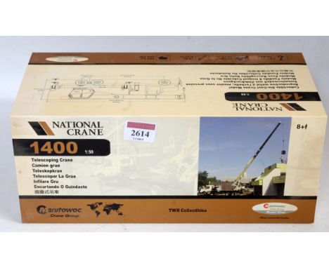 A TWH Collectables 1/50 scale model of a National Crane 1400 telescoping crane, housed in the original polystyrene packed sli