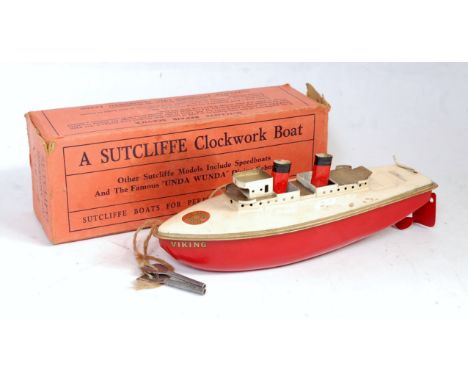A Sutcliffe tinplate and clockwork Viking twin funnel passenger liner boat comprising of cream and gold upper deck with red h