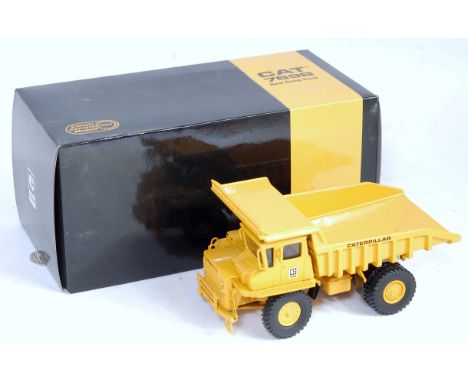 A Classic Construction Models 1/50 scale white metal hand built model of a Caterpillar 769B rear dump truck, comprising of ye