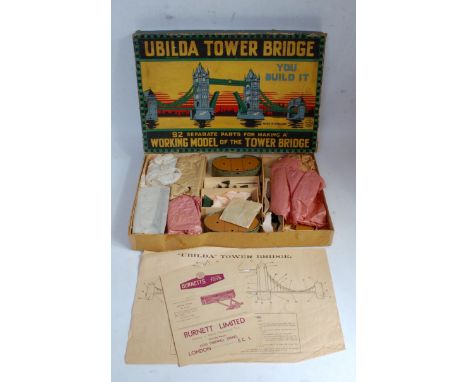 A Burnett Ubilda Tower Bridge - rare example comprising of various tinplate constructional components to fully construct a to