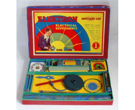 A Meccano No. 1 Elektron set, circa 1935, housed in the original lift-off lid all-card box with tray type divided base, some 