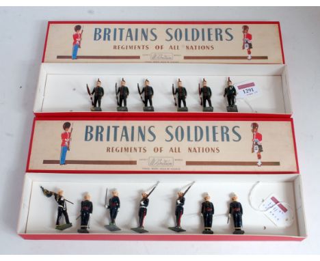 Two replica Britains boxes containing a quantity of original Britains soldiers, examples to include from set 2072 Kings Royal